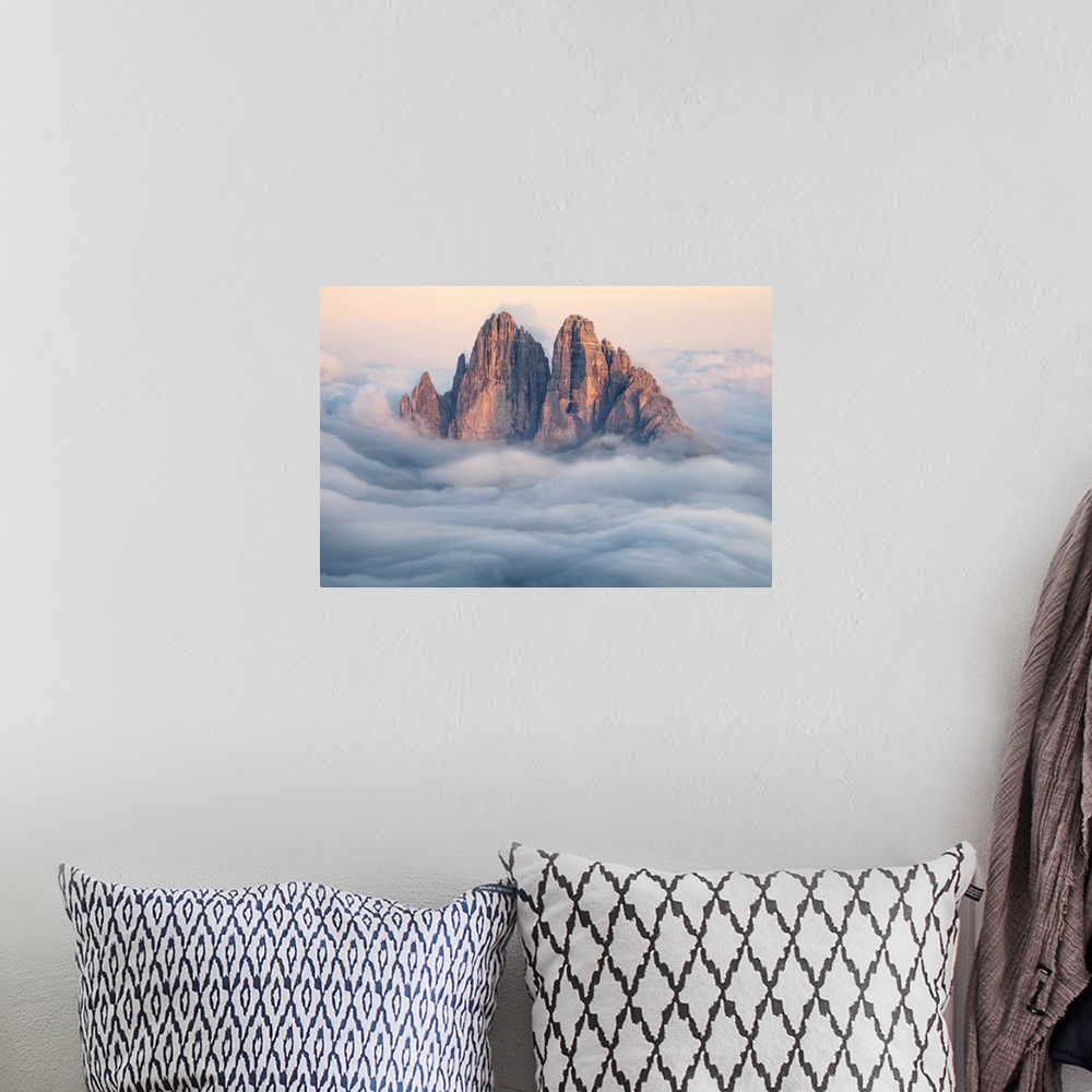 A bohemian room featuring Tre Cime di Lavaredo emerging from the clouds, Sexten Dolomites, South Tyrol, Bolzano, Italy, Europe
