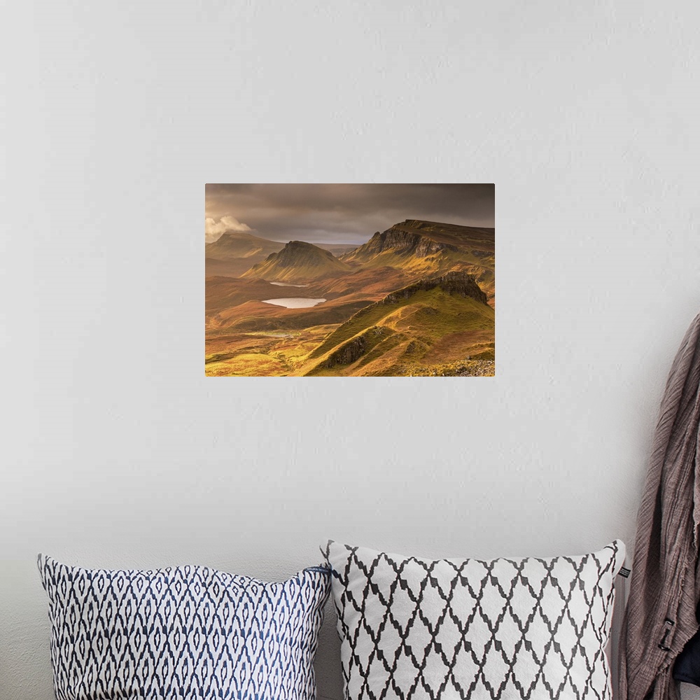 A bohemian room featuring Dramatic light over the Trotternish mountain ridge from the Quiraing, Isle of Skye, Scotland.