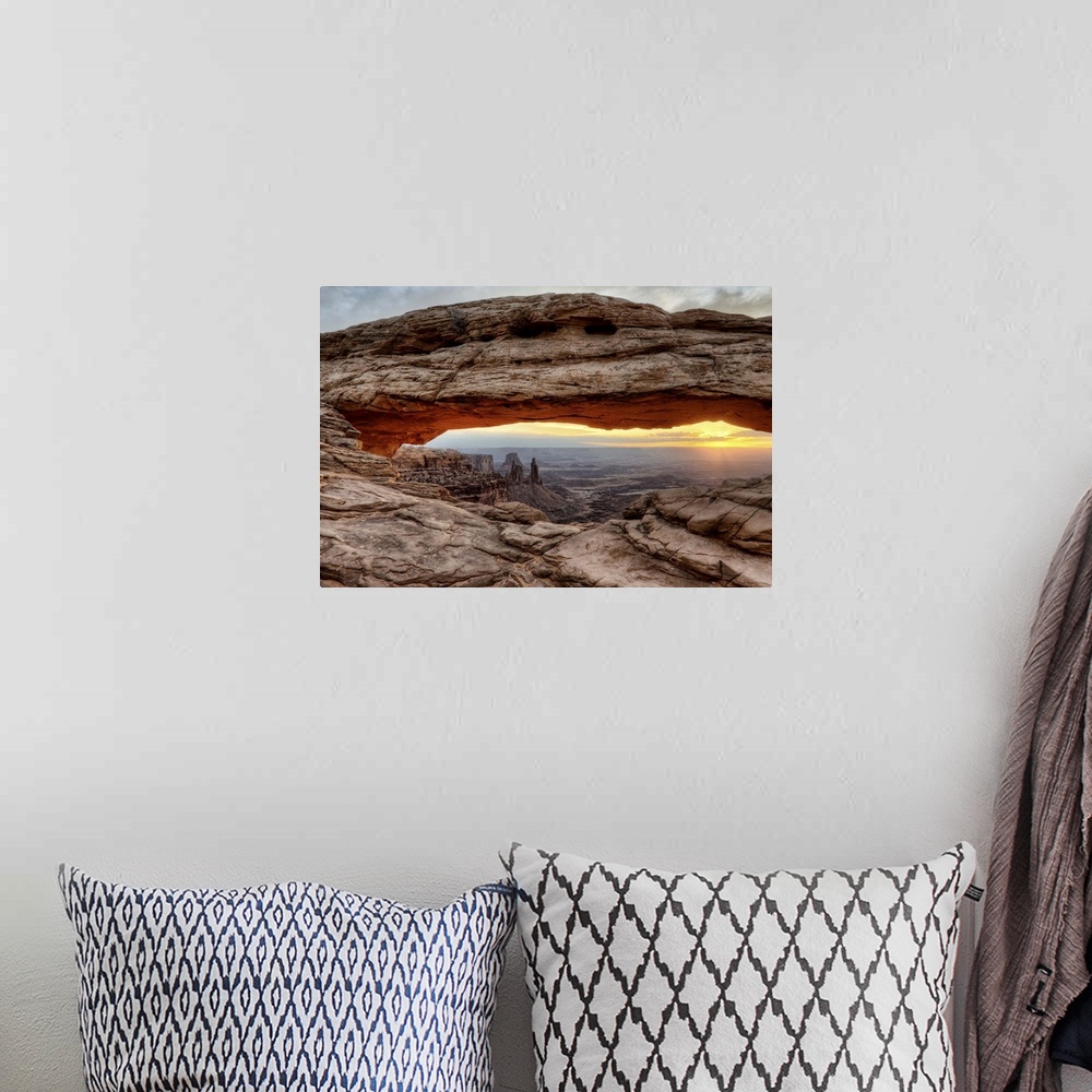 A bohemian room featuring U.S.A., Utah, Canyonlands National Park, Mesa Arch at sunrise.