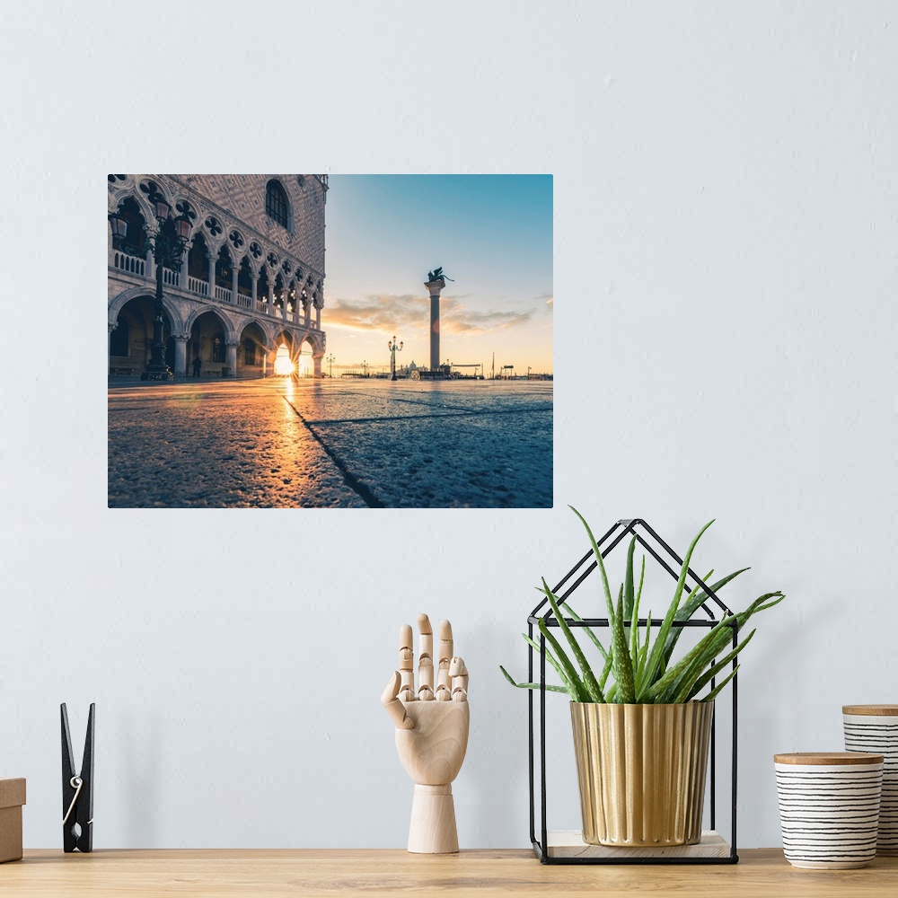 A bohemian room featuring Venice, Veneto, Italy. Sunrise Through The Arches Of Doge's Palace In Piazzetta San Marco.