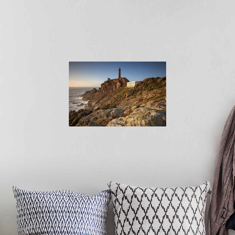 A bohemian room featuring Cabo Vilan, Camarinas, A Coruna district, Galicia, Spain, Europe. View of Cabo Vilan lighthouse