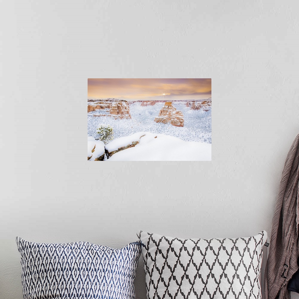 A bohemian room featuring Sun rises over the landscape of fresh snow, Colorado National Monument