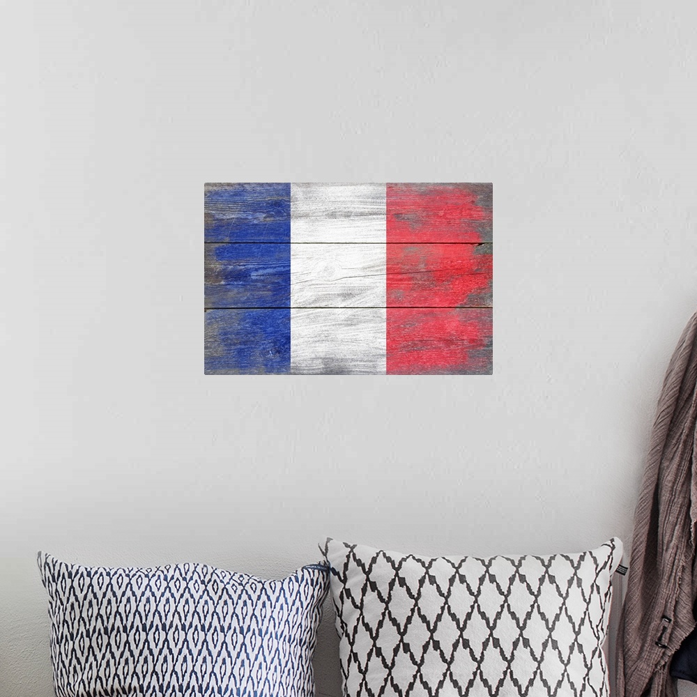 A bohemian room featuring The flag of France with a weathered wooden board effect.