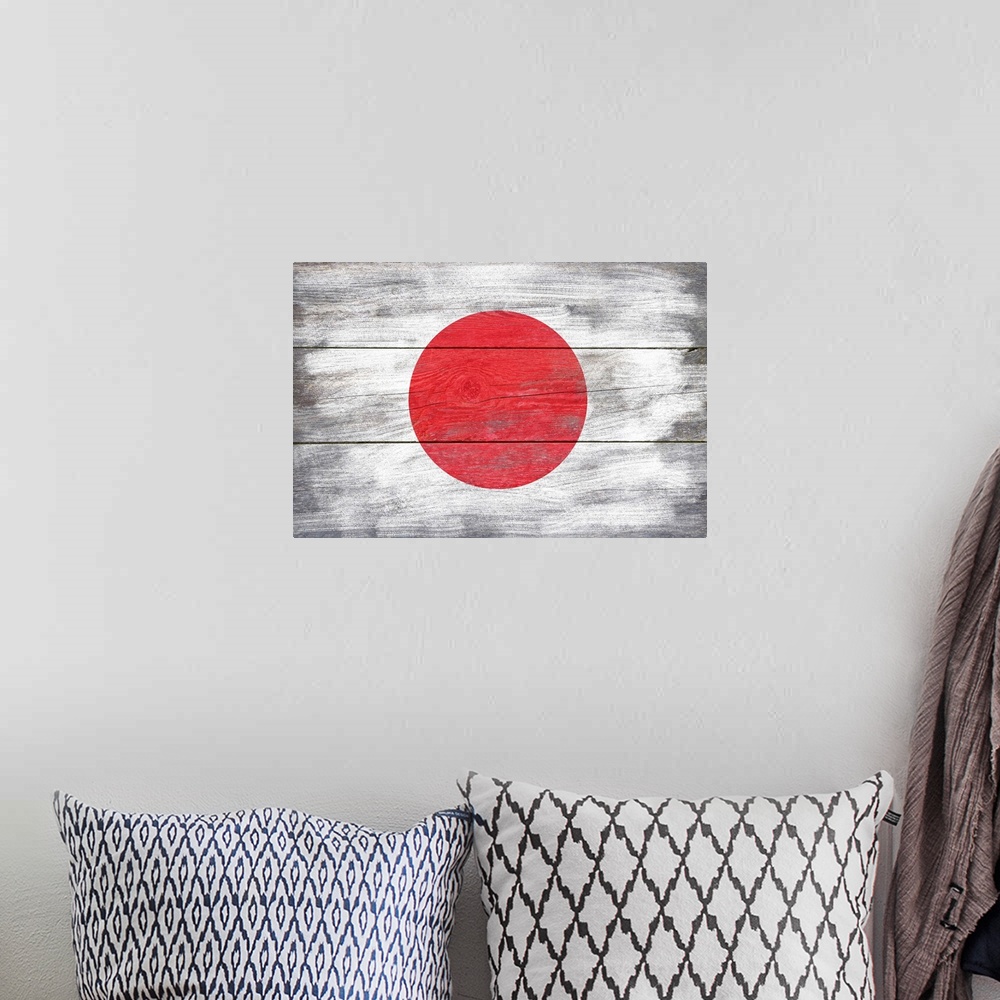A bohemian room featuring The flag of Japan with a weathered wooden board effect.