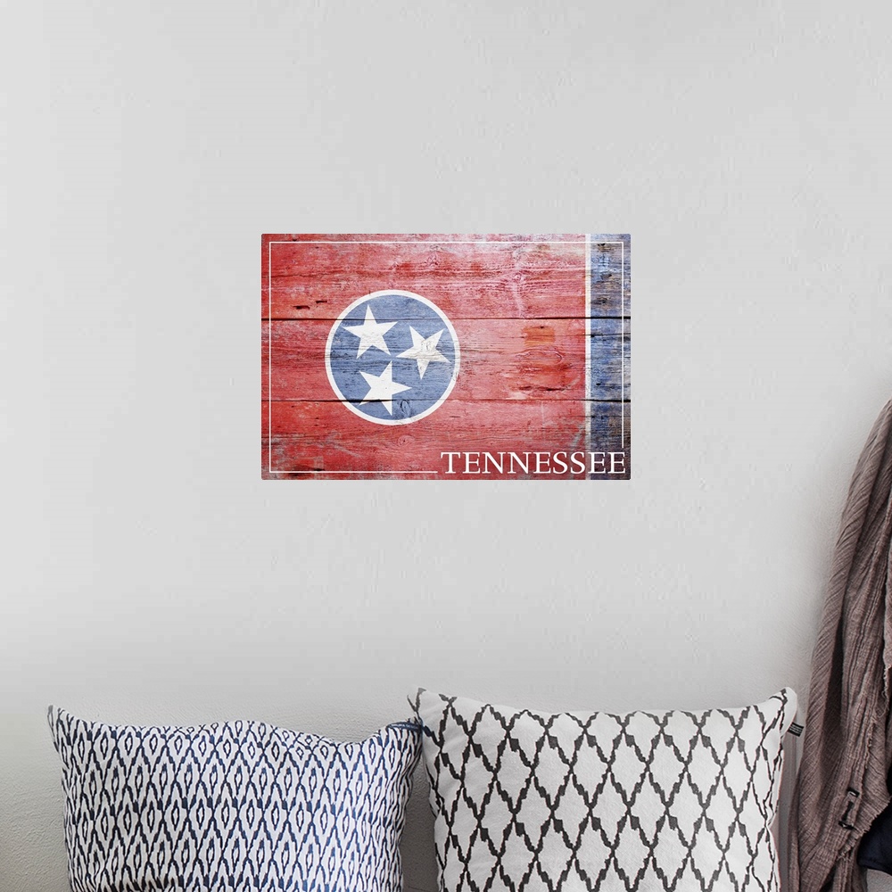 A bohemian room featuring The flag of Tennessee with a weathered wooden board effect.
