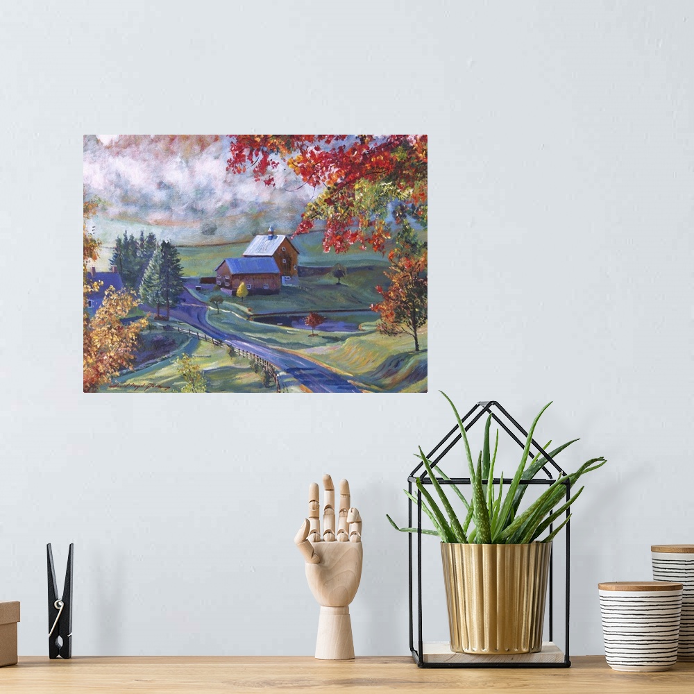 A bohemian room featuring Landscape painting of a red barn in the countryside.