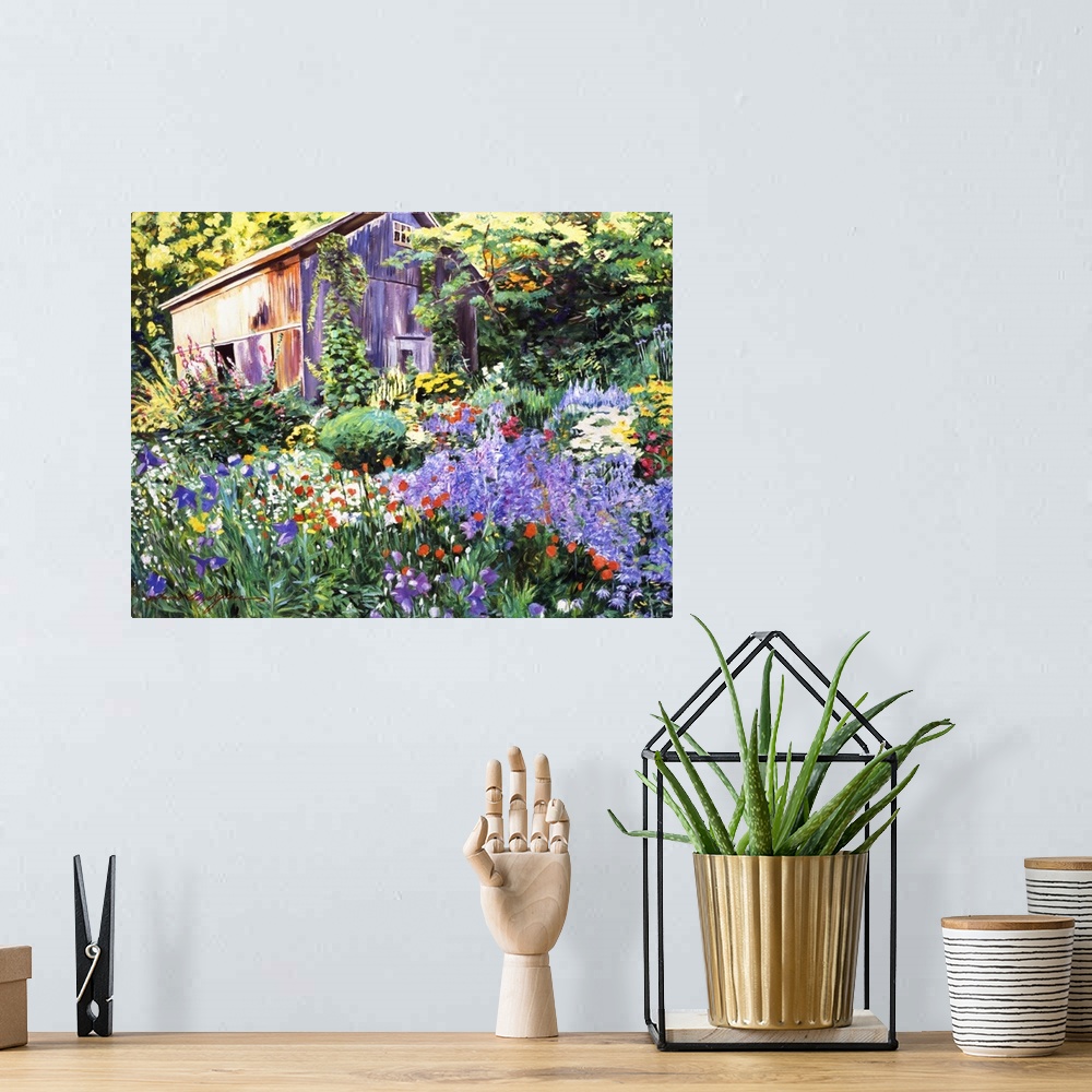 A bohemian room featuring Painting of a garden in full bloom with a wooden shed hidden among the trees.