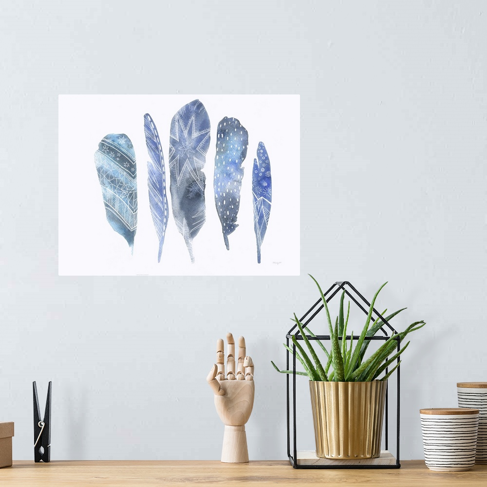 A bohemian room featuring Watercolor artwork of five blue feathers with white patterns.