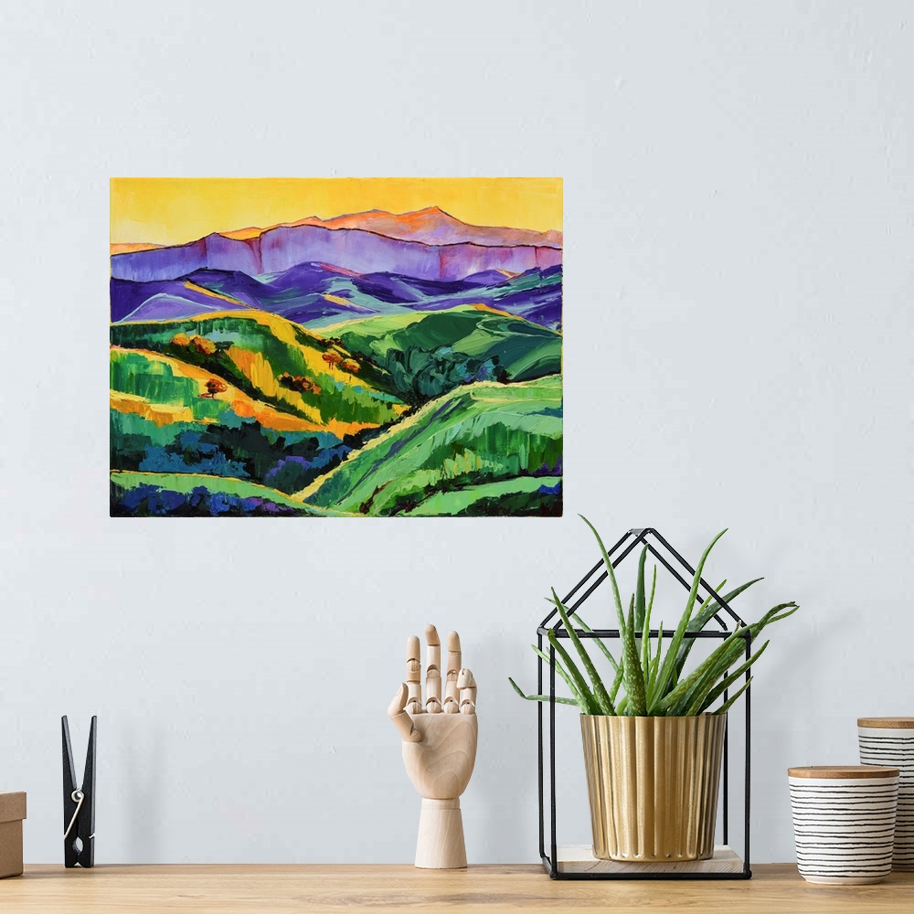 A bohemian room featuring Scene of verdant mountains and valley.