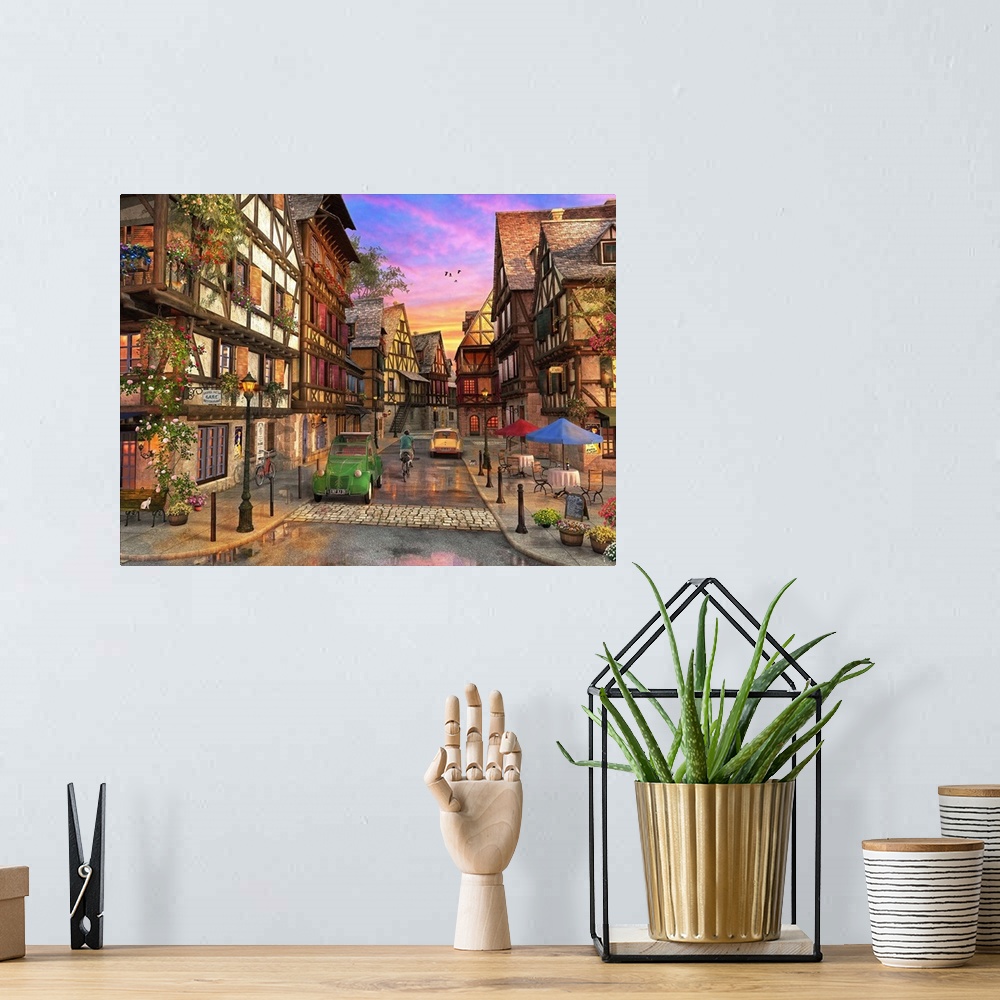 A bohemian room featuring Illustration of the town of Colmar at sunset.