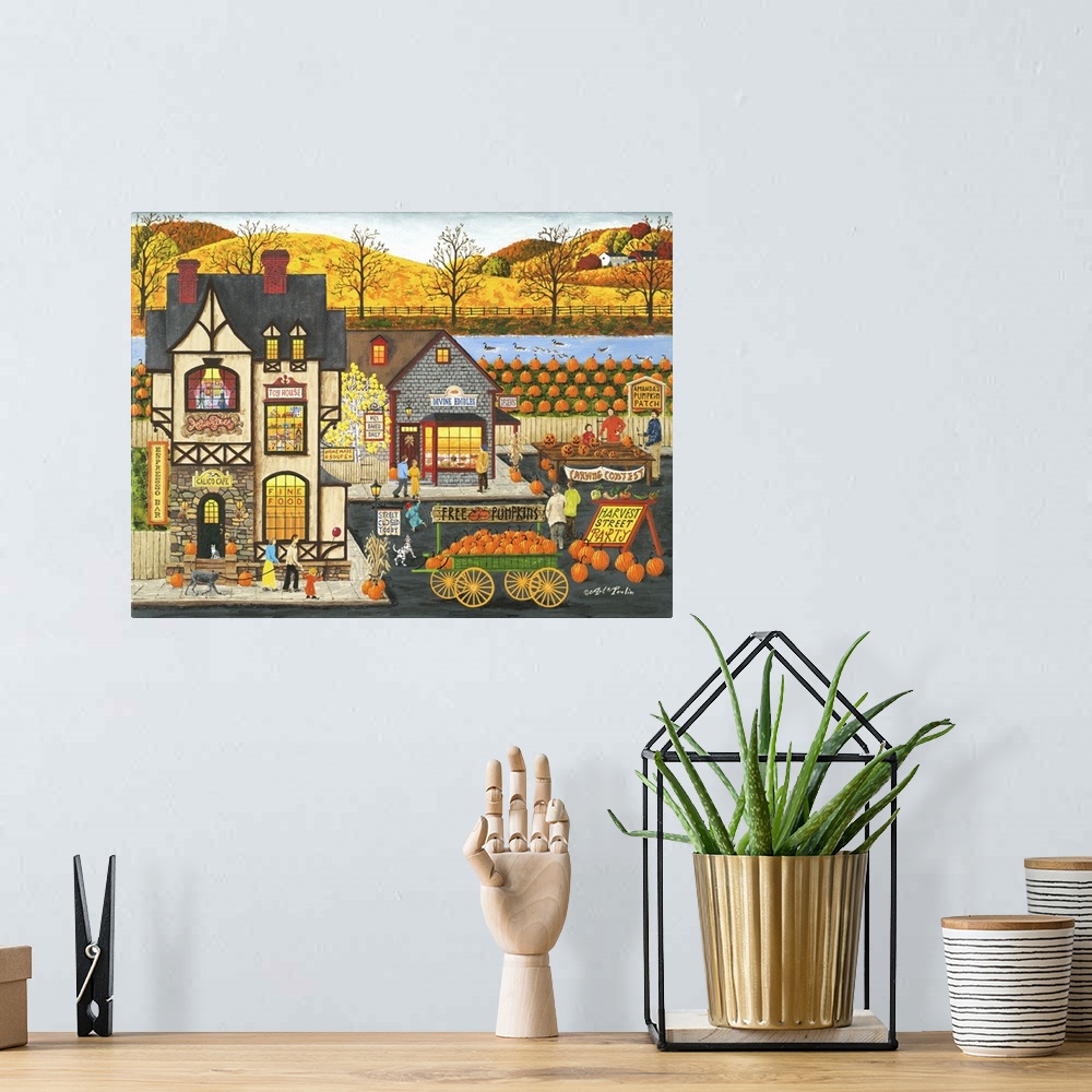 A bohemian room featuring Americana scene of a street full of shops with pumpkins and fall activities.