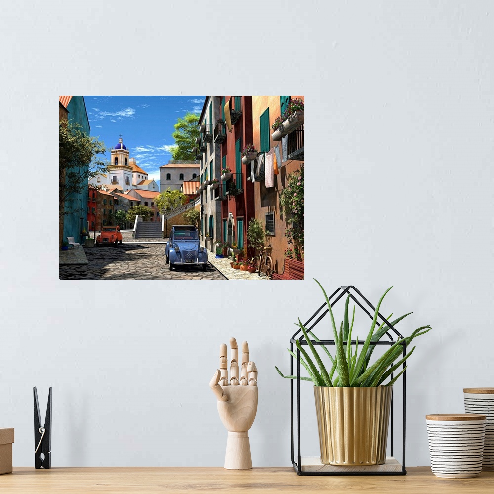 A bohemian room featuring Bright colored cars and buildings line a stone street and photographed during a sunny day.