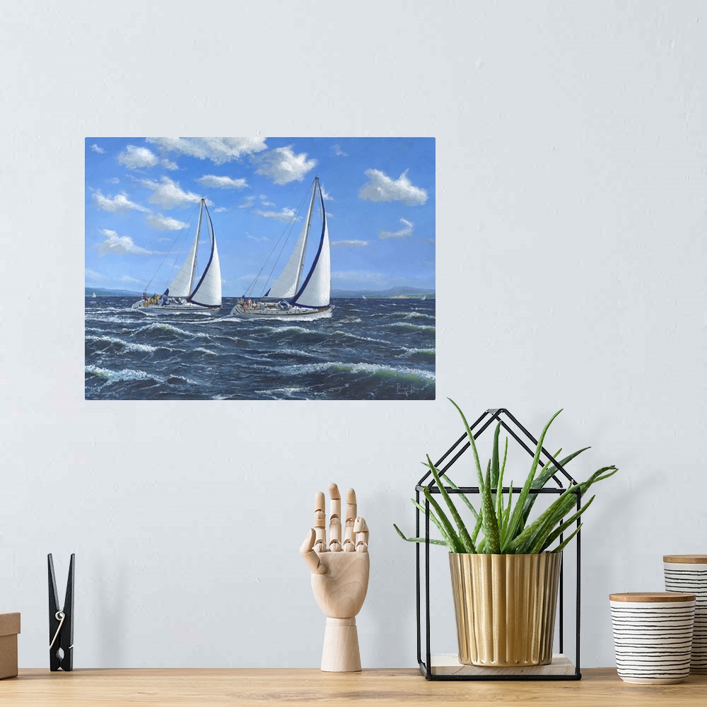 A bohemian room featuring Contemporary artwork of two sailboats on open seas.