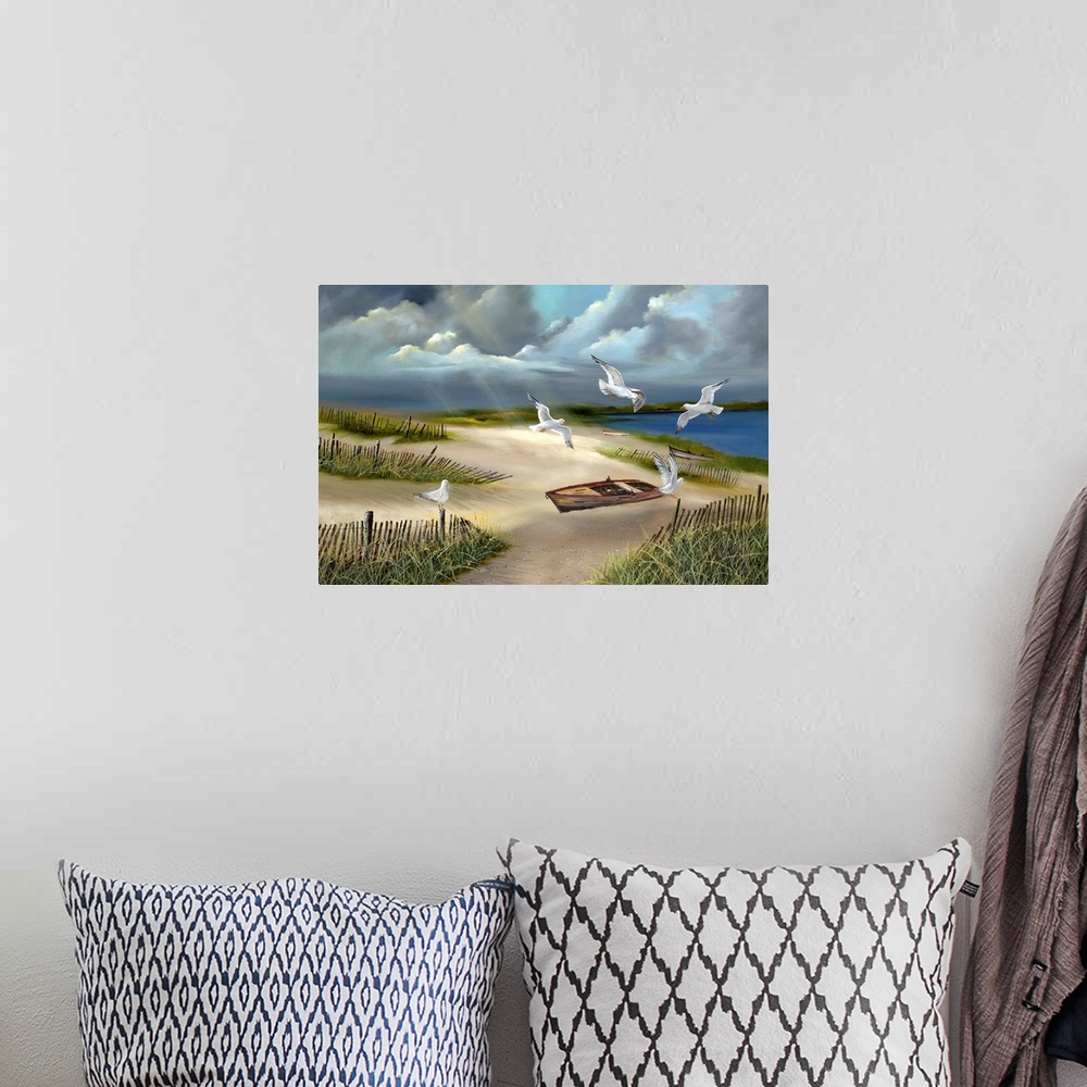 A bohemian room featuring Contemporary artwork of beach landscape under a cloudy sky.