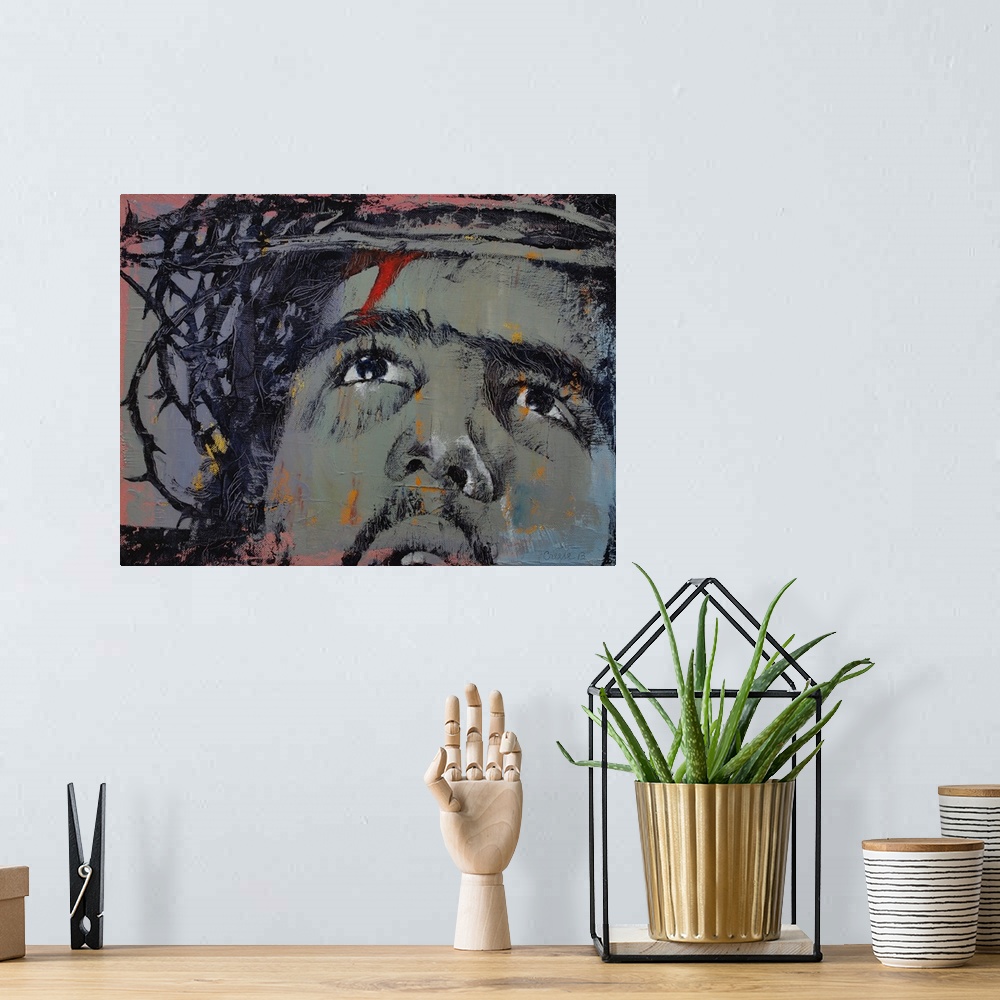 A bohemian room featuring A contemporary painting of a close-up on the face of Jesus wearing the crown of thorns.