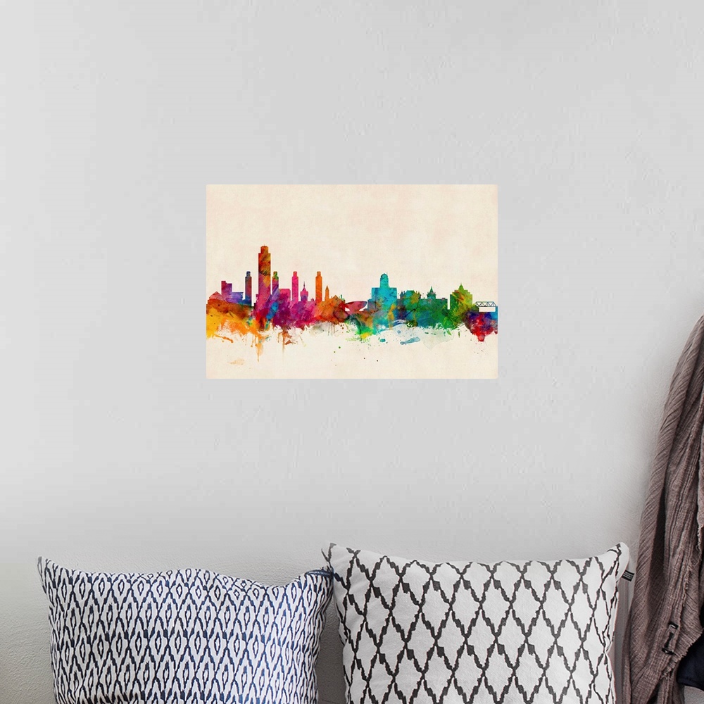 A bohemian room featuring Contemporary piece of artwork of the New York City skyline made of colorful paint splashes.