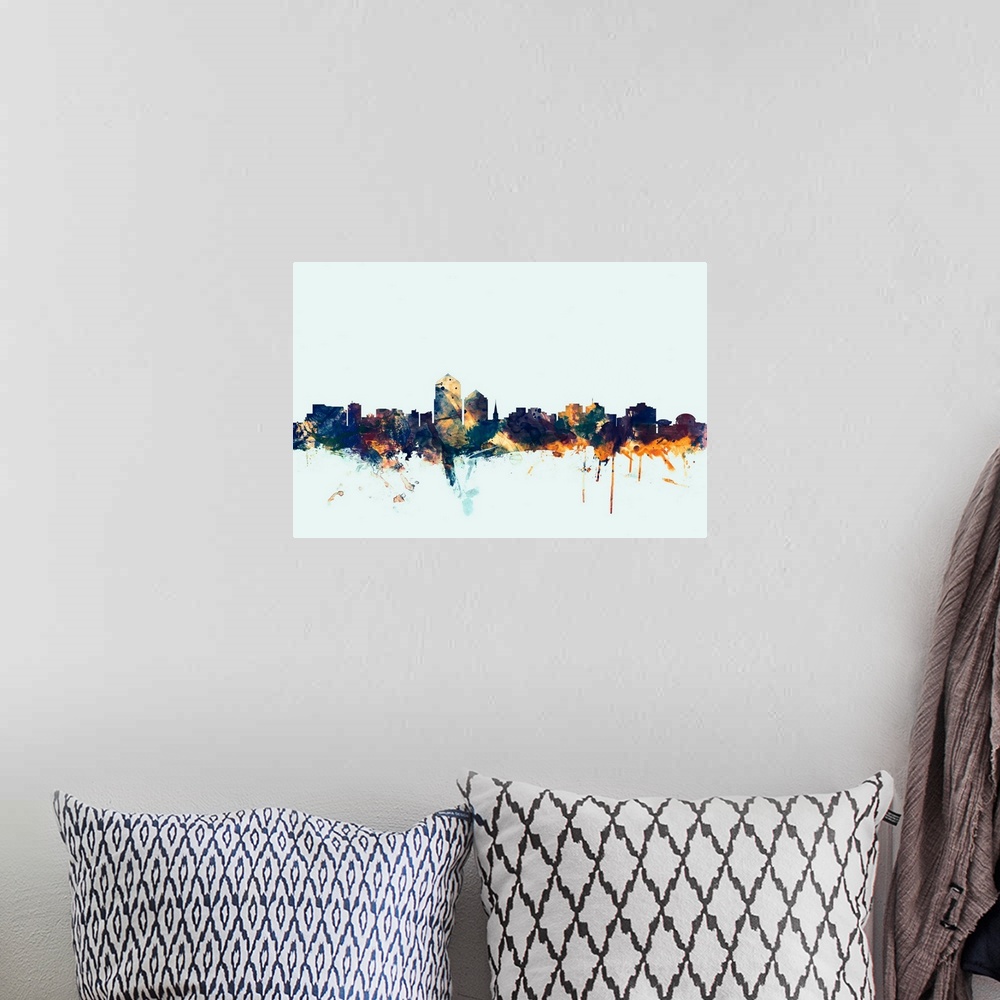 A bohemian room featuring Dark watercolor silhouette of the Albuquerque city skyline against a light blue background.