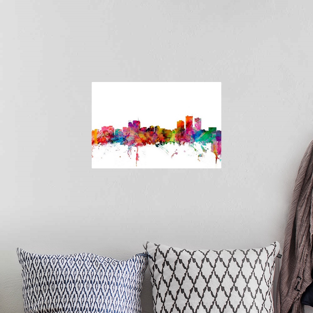 A bohemian room featuring Watercolor artwork of the Anchorage skyline against a white background.