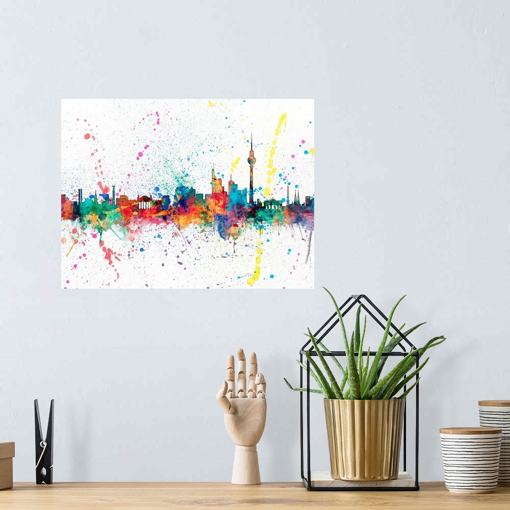 A bohemian room featuring Wild and vibrant paint splatter silhouette of the Berlin skyline.