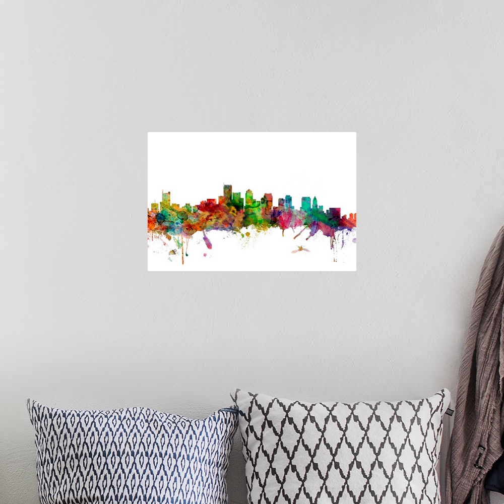 A bohemian room featuring Watercolor artwork of the Boston skyline against a white background.