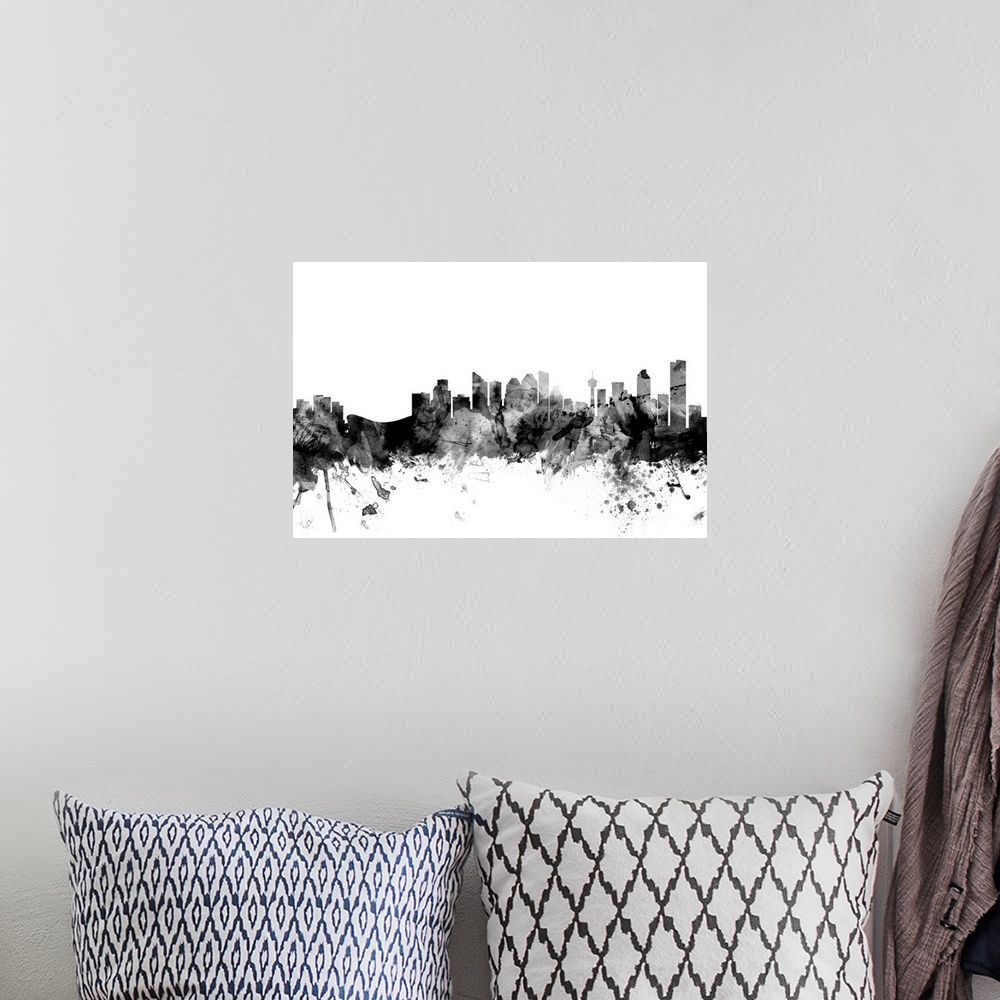 A bohemian room featuring Contemporary artwork of the Calgary city skyline in black watercolor paint splashes.
