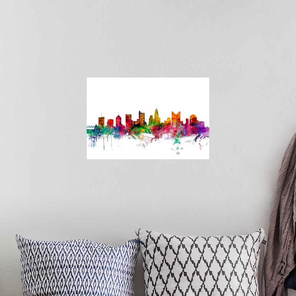A bohemian room featuring Watercolor artwork of the Columbus skyline against a white background.