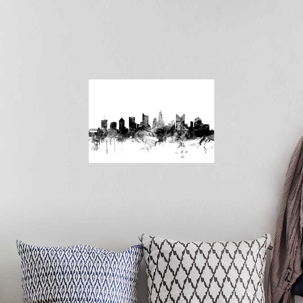 A bohemian room featuring Contemporary artwork of the Columbus city skyline in black watercolor paint splashes.
