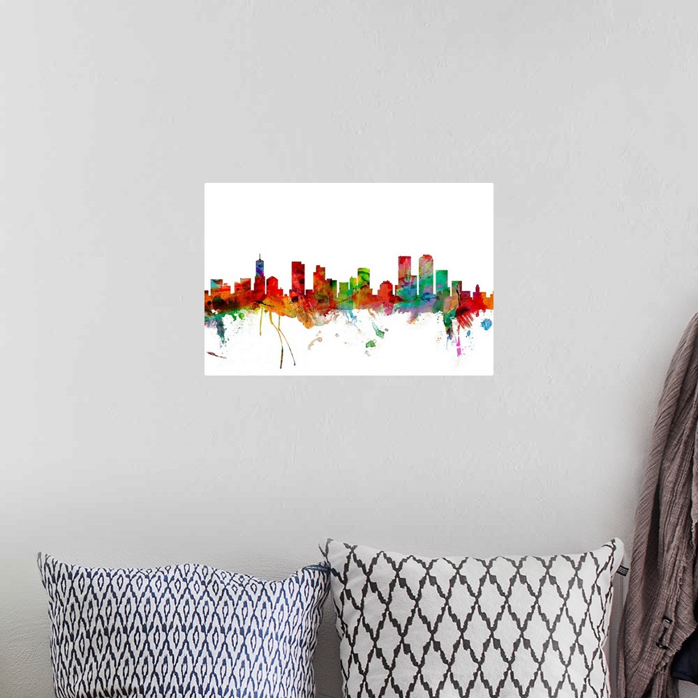 A bohemian room featuring Watercolor artwork of the Denver skyline against a white background.
