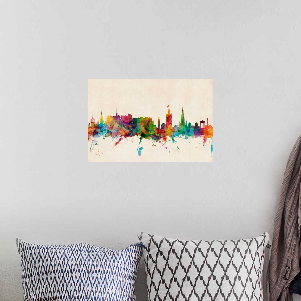 A bohemian room featuring Contemporary piece of artwork of the Edinburgh, Scotland skyline made of colorful paint splashes.