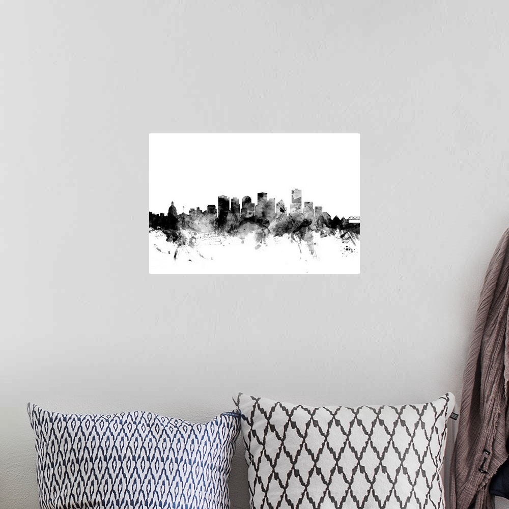 A bohemian room featuring Contemporary artwork of the Edmonton city skyline in black watercolor paint splashes.