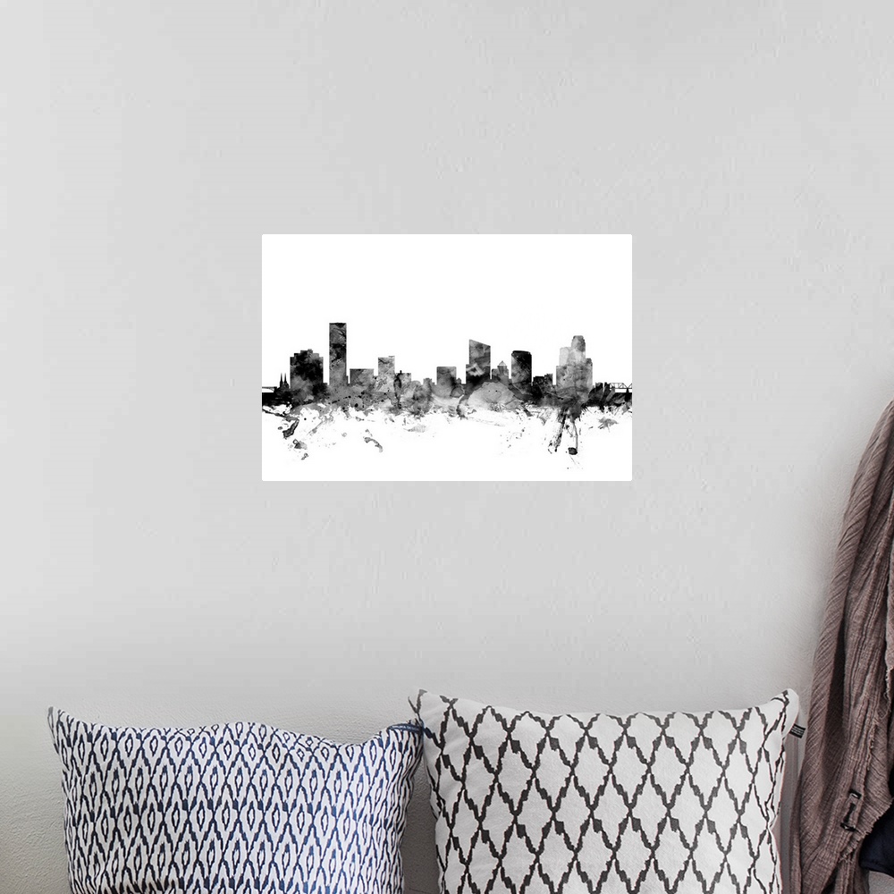 A bohemian room featuring Contemporary artwork of the Grans Rapids city skyline in black watercolor paint splashes.