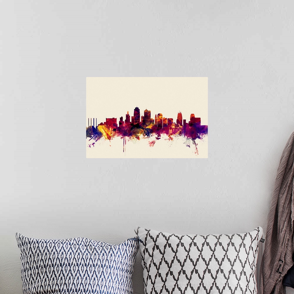 A bohemian room featuring Contemporary artwork of the Kansas City skyline in watercolor paint splashes.