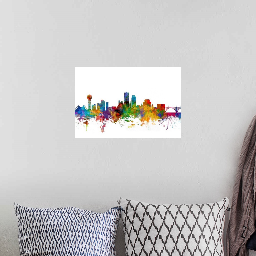 A bohemian room featuring Colorful watercolor splattered silhouetted of the Knoxville city skyline.