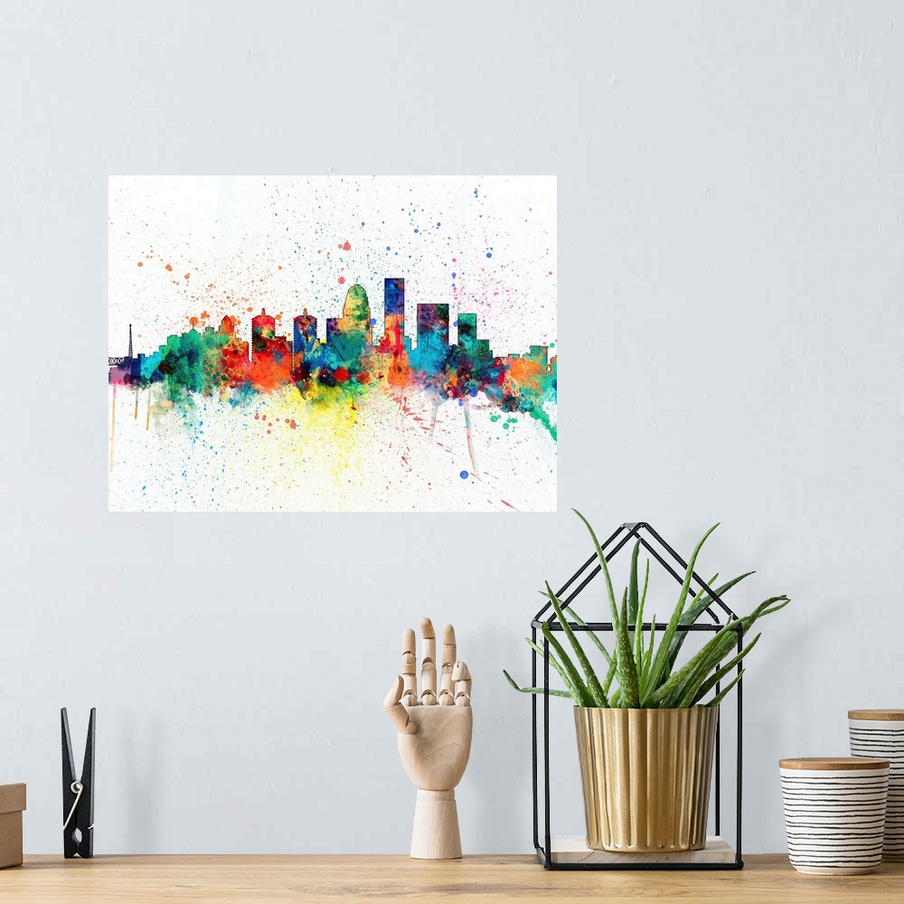 A bohemian room featuring Wild and vibrant paint splatter silhouette of the Louisville skyline.