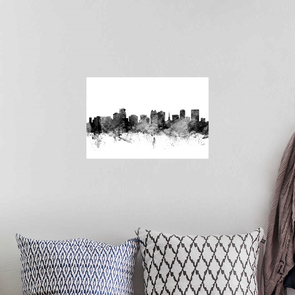 A bohemian room featuring Smokey dark watercolor silhouette of the Orlando city skyline.