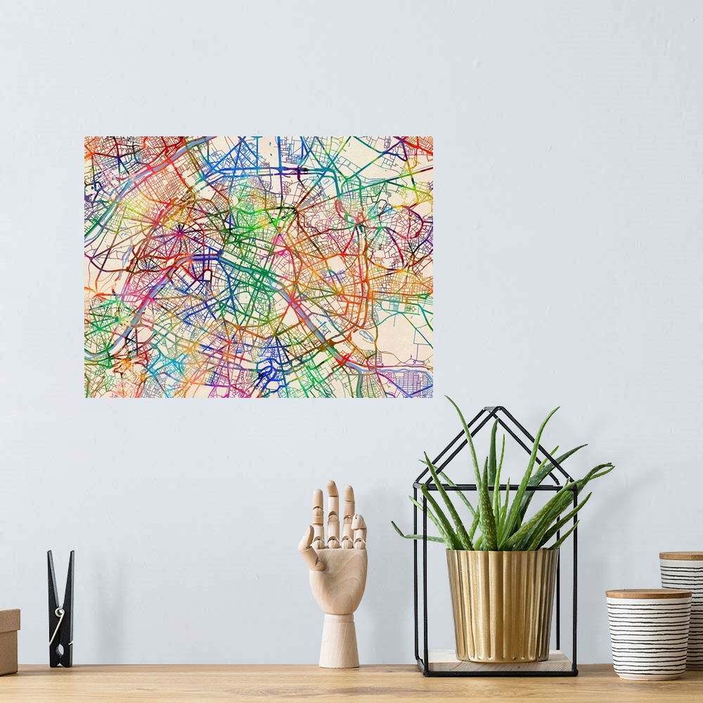 A bohemian room featuring A watercolor street map of Paris, France.