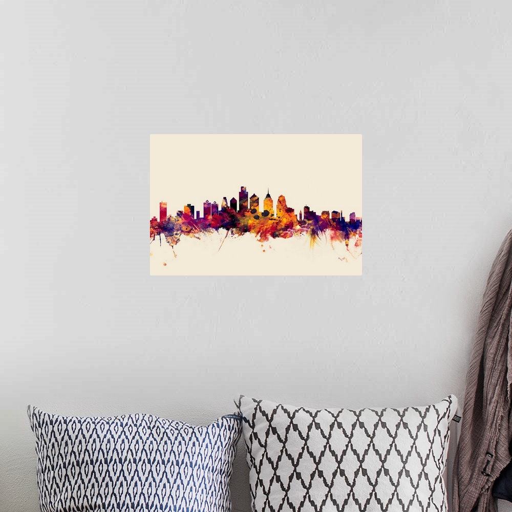 A bohemian room featuring Watercolor artwork of the Philadelphia skyline against a beige background.