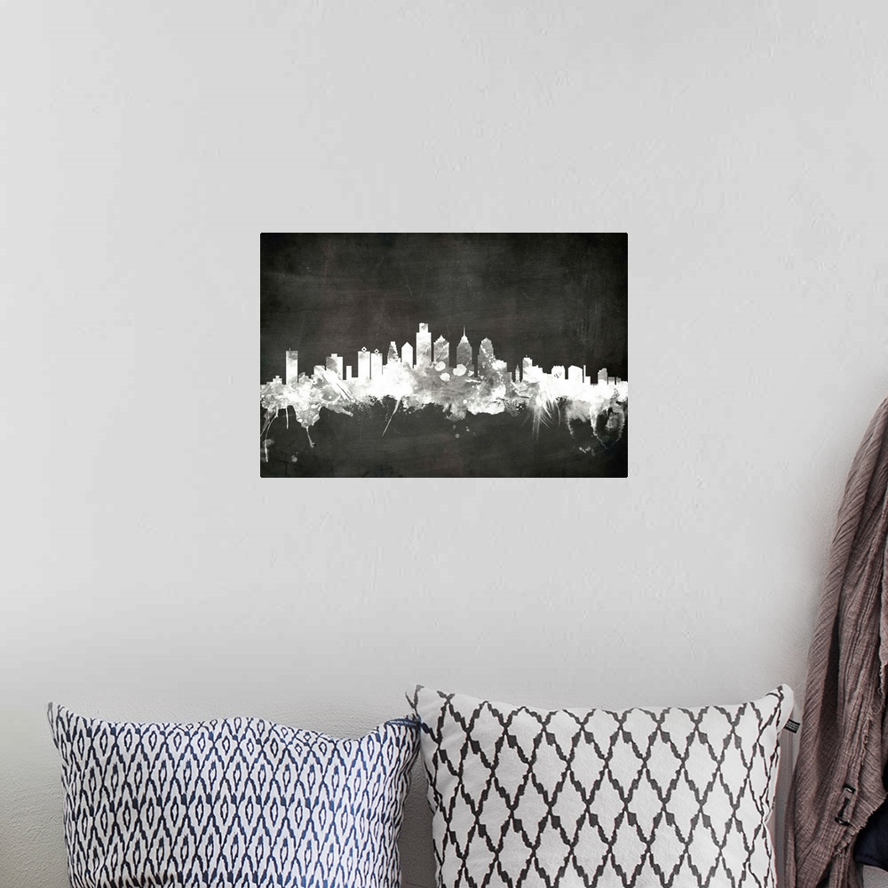 A bohemian room featuring Smokey dark watercolor silhouette of the Philadelphia city skyline against chalkboard background.