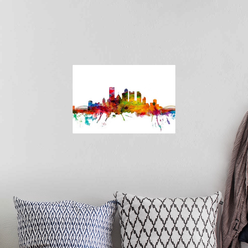 A bohemian room featuring Watercolor artwork of the Pittsburgh skyline against a white background.