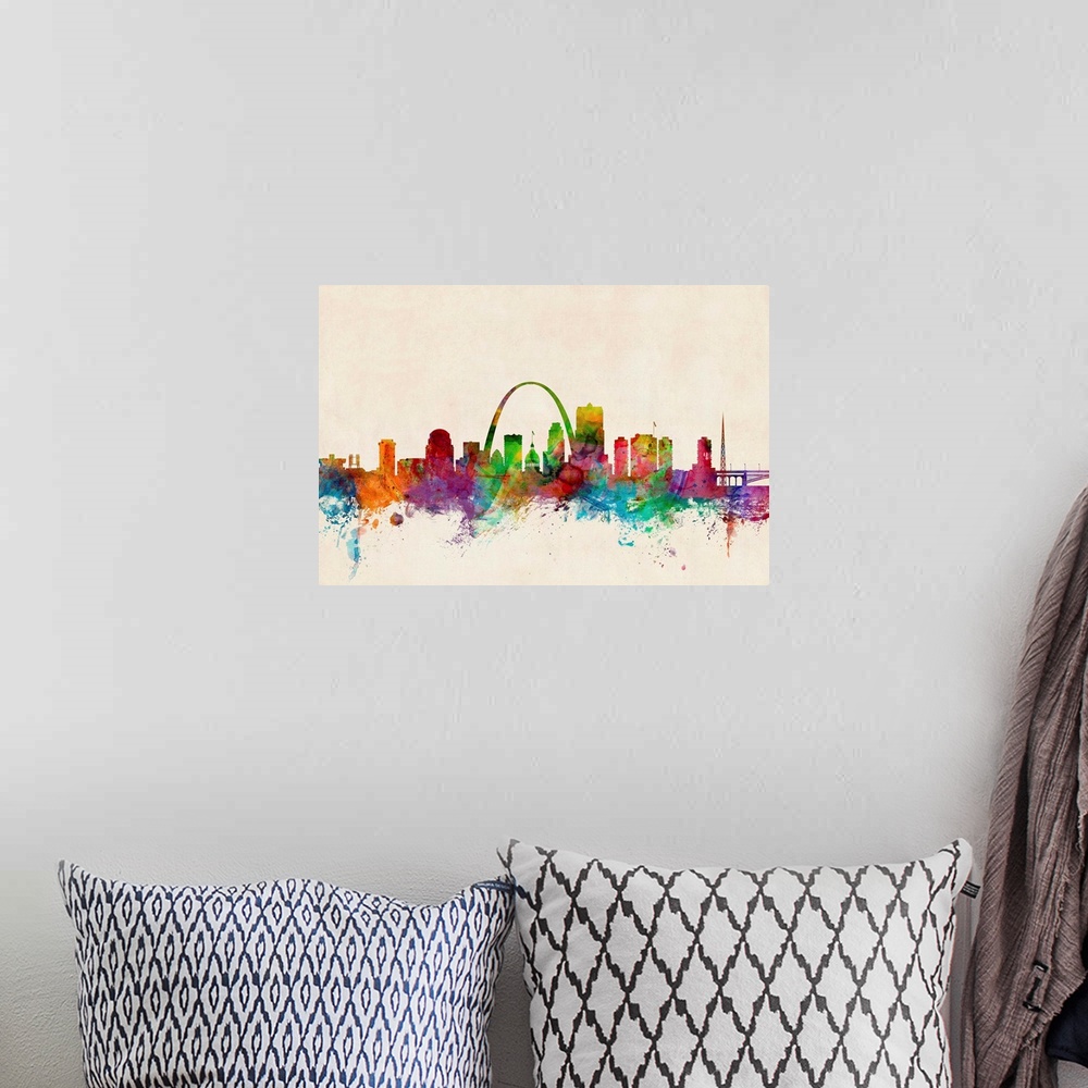 A bohemian room featuring Contemporary piece of artwork of the St Louis skyline made of colorful paint splashes.