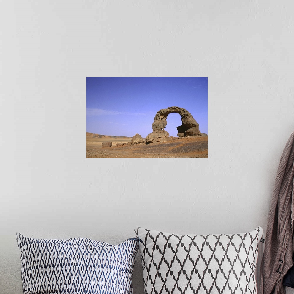 A bohemian room featuring Algeria, Ahaggar mountains, stone arch