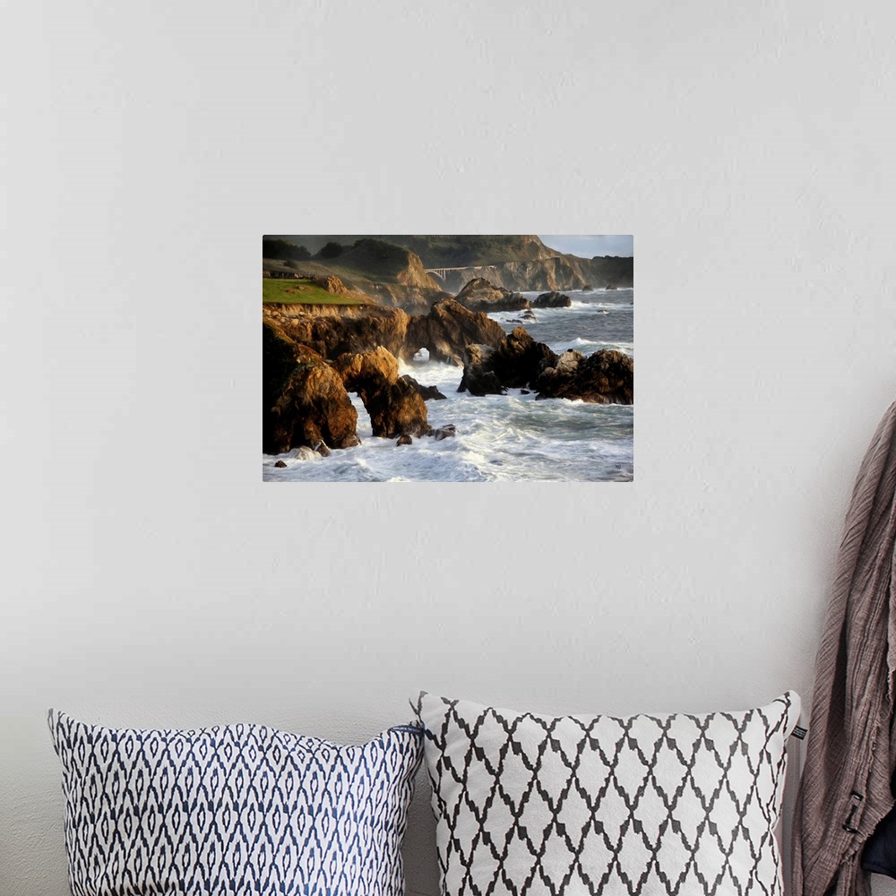 A bohemian room featuring A spectacular view of the rugged coastline in Big Sur with the Rocky Creek Bridge in the distance...