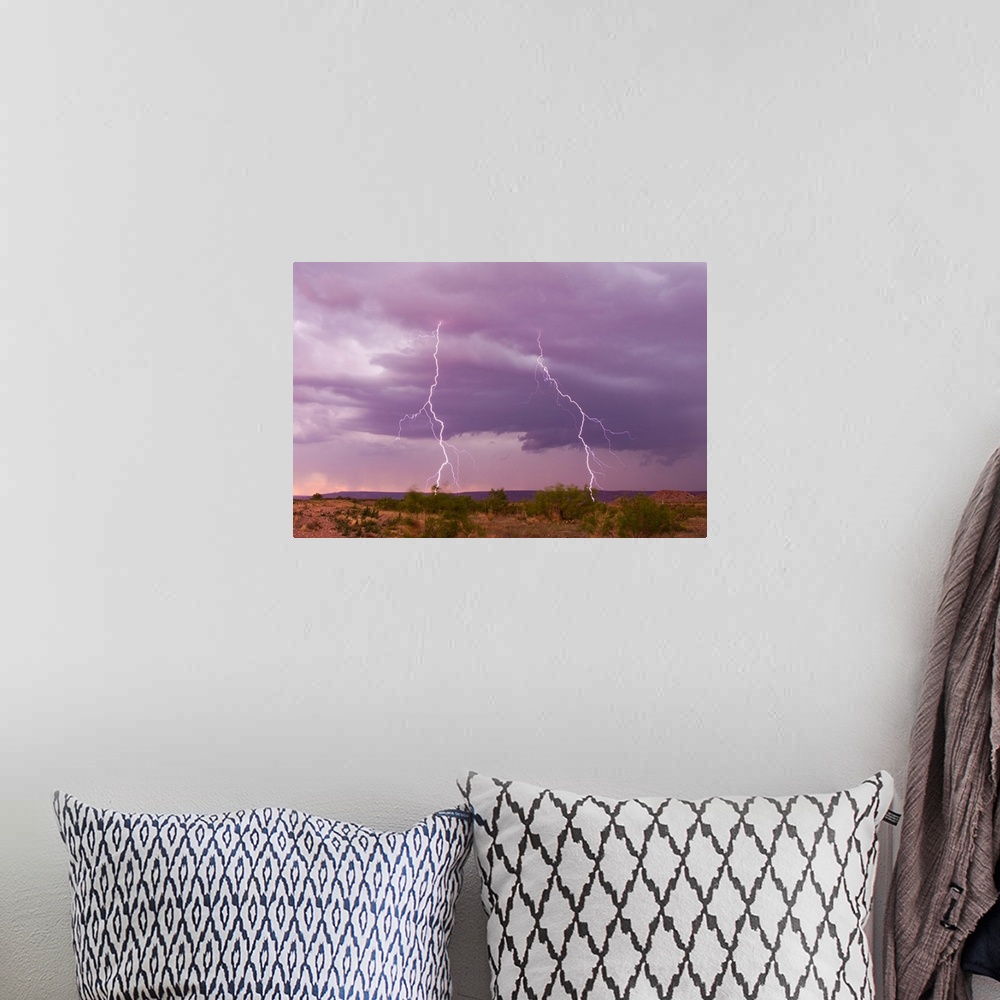 A bohemian room featuring Intense purple lightning bolts strike in the desert of New Mexico.
