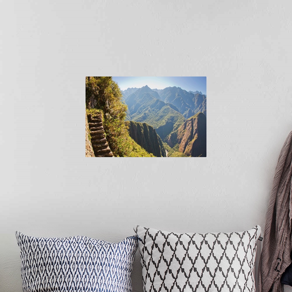 A bohemian room featuring Steep stairs on a mountain side on the Inca trail at Machu Picchu.