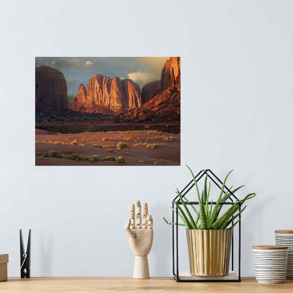 A bohemian room featuring Camel Butte rising from the desert floor, Monument Valley, Arizona