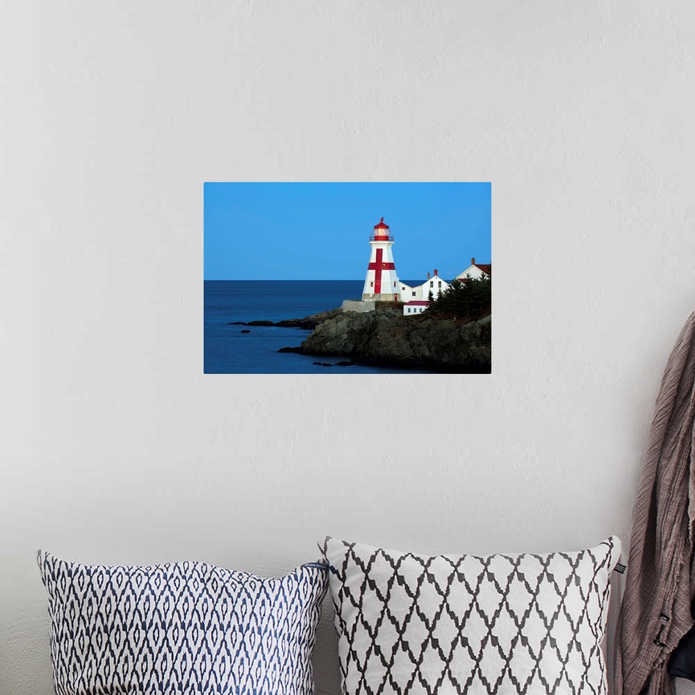 A bohemian room featuring Campobello Lighthouse, Gulf of Maine,dusk