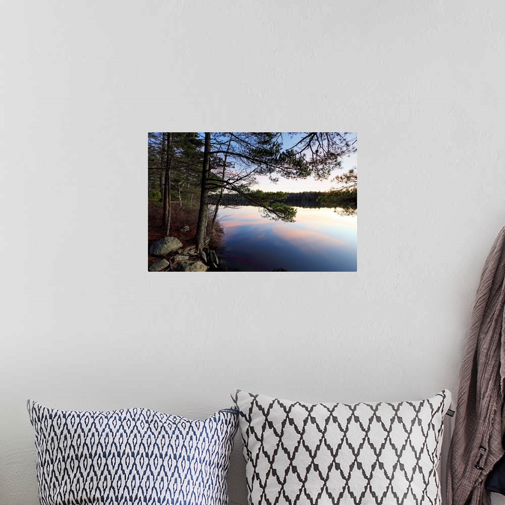 A bohemian room featuring sunset on kejimkujik national park lake and