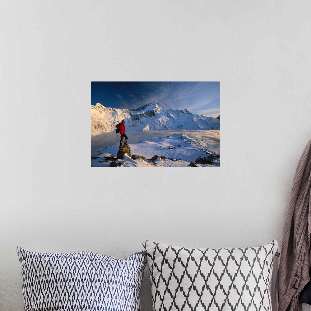 A bohemian room featuring Mt Sefton, climber at dawn above Mueller hut and cloud-filled Mueller Glacier, Mt Cook National P...
