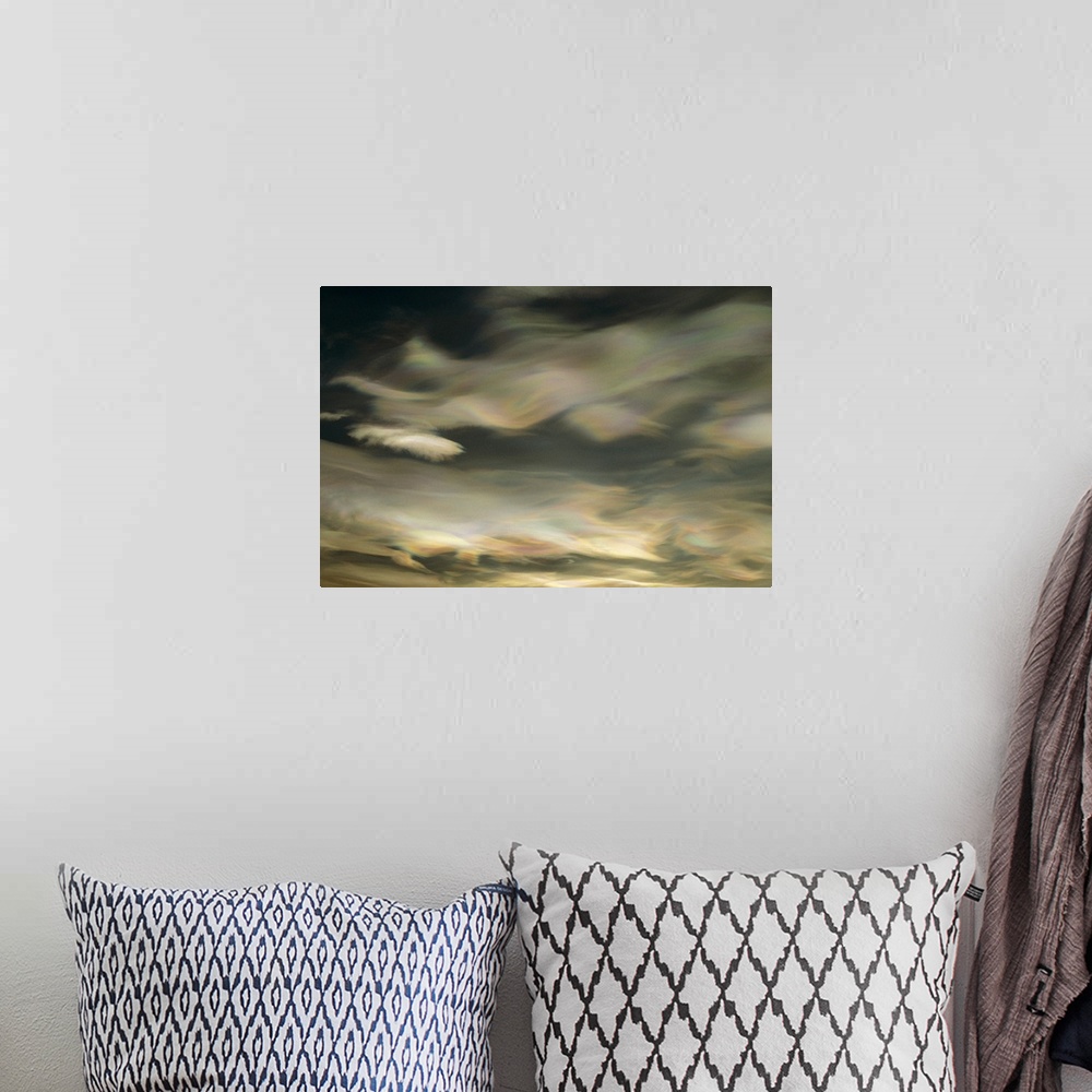 A bohemian room featuring An abstract artwork piece of clouds in a winter sky. There is a pearl essence and wave like appea...