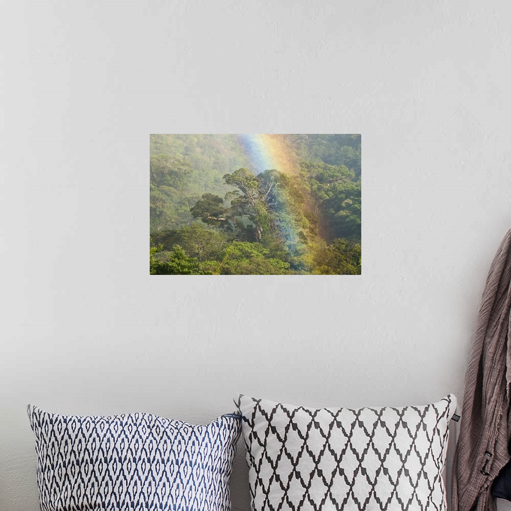 A bohemian room featuring rainbow, costa rica, scenic
